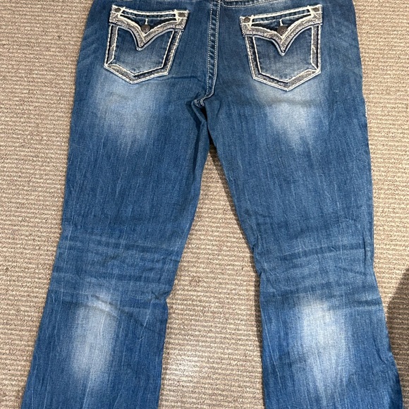 Two size 12 vigoss jeans. Like new, never dried in dryer. - Picture 2 of 6